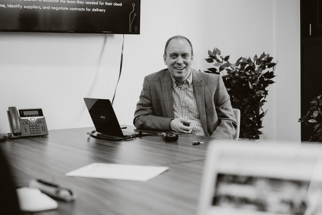 Andrew Horler in a meeting