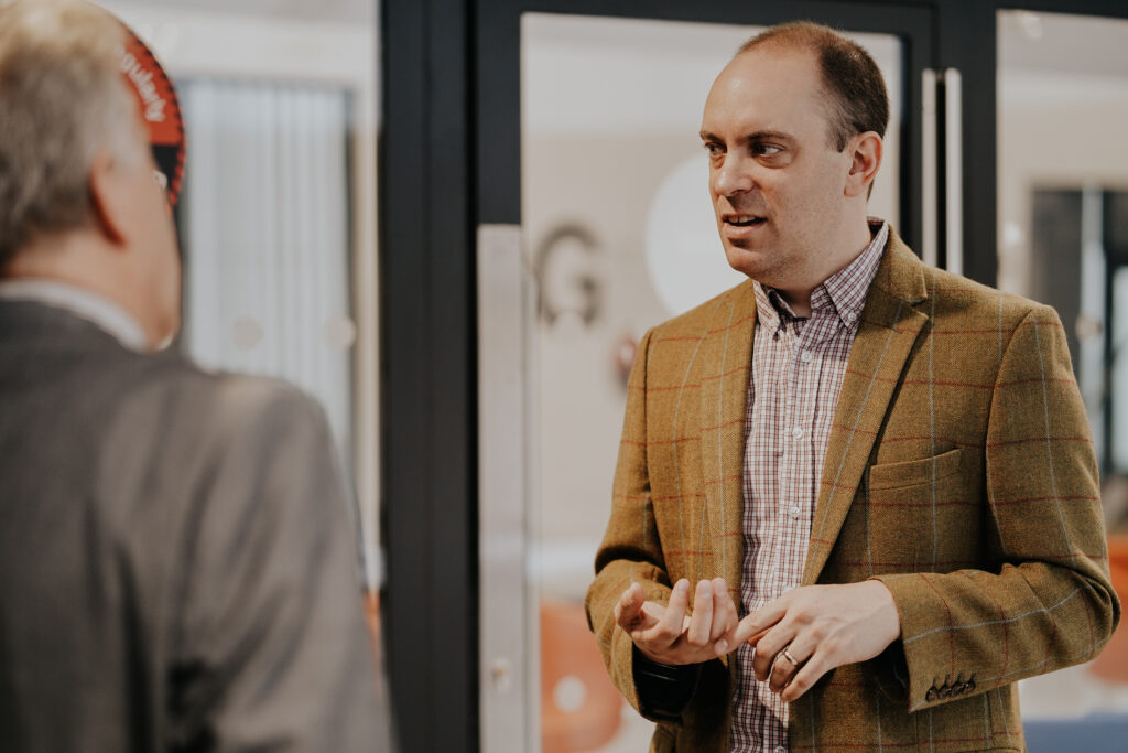 Picture showing Andrew Horler in conversation